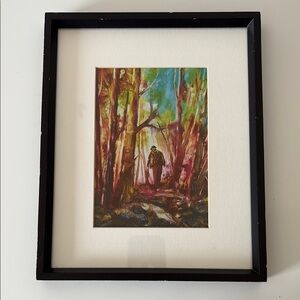 Print of a lone figure walking through a vibrant sun-dappled forest